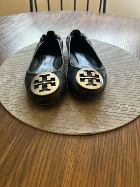 Tory Burch Black Leather Logo Round-Toe Flats with Gold Medallions